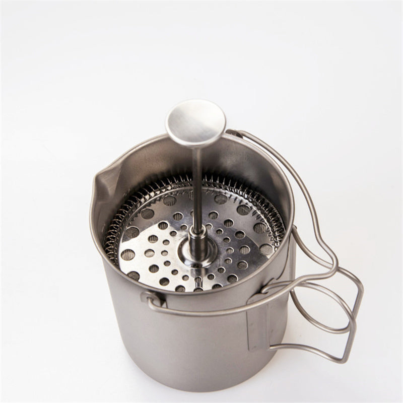 Pure titanium French press by Cavira with 750ml capacity, lightweight, antibacterial, and flavor-neutral for coffee and tea brewing.