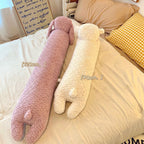 Oversized Cavira plush pillow featuring a long-waisted bear and rabbit design, perfect for cuddling on beds and sofas.