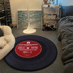 Eprolo vinyl record-themed round floor mat used as a hanging basket, tea table, or non-slip foot mat in living room.