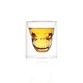 Double wall skull-shaped borosilicate glass by Cavira, designed for whiskey, beer, and cocktails, with a creative skull design.