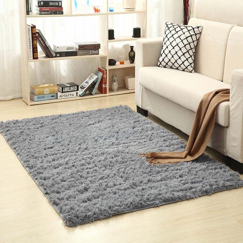 Cavira super soft shag area rug in silky polyester, modern design, ideal for living rooms, bedrooms, and nurseries.