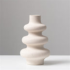 Frosted grain ceramic vase by Cavira with textured matte finish, ideal for flower arrangements and home decor.