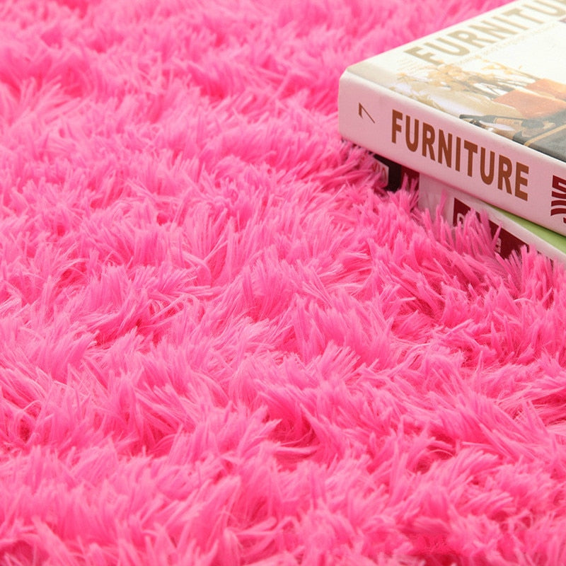 Cavira super soft shag area rug with silky polyester fibers, modern design, perfect for living rooms, bedrooms, and nurseries.
