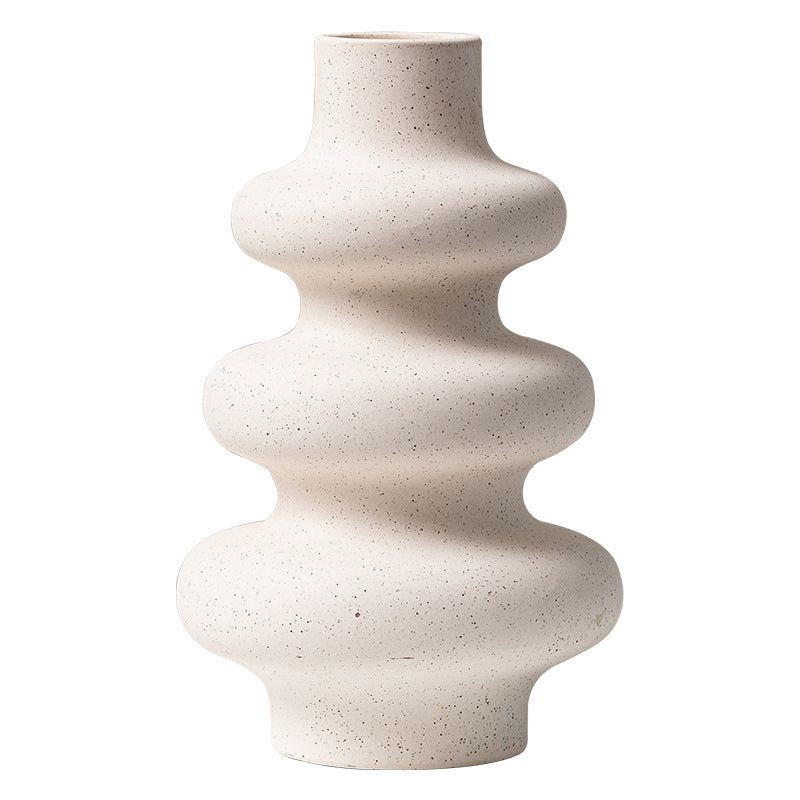 Frosted grain ceramic vase by Cavira with textured matte finish, ideal for flower arrangements and home decor display.
