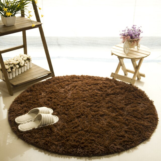 Cavira round shaggy faux fur rug with 4.5cm pile, available in 6 sizes and 8 colors, non-slip latex base for bedrooms and living rooms.