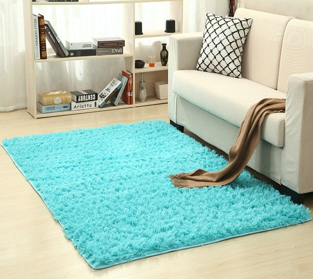 Cavira super soft shag area rug in modern silky polyester, plush floor mat for living room, bedroom, or nursery.