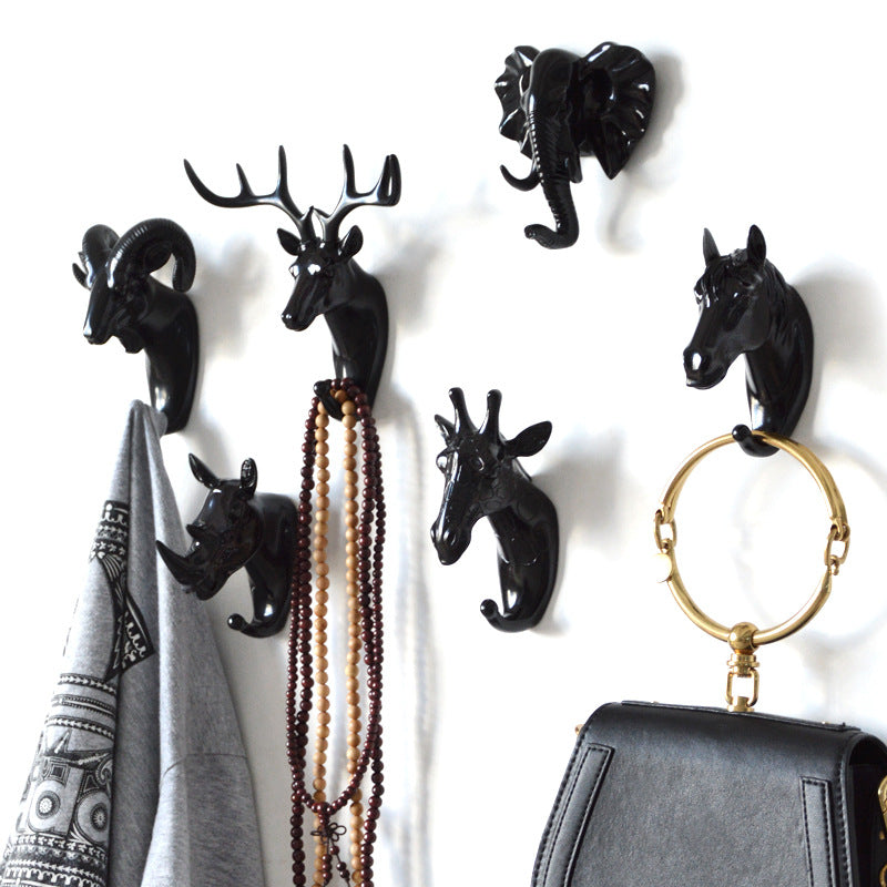 Decorative Nordic resin animal wall hook and key rack by Cavira, punch-free hanger for entryway, bedroom, and home decor.