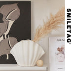 White porcelain ceramic vase by Cavira, modern minimalist design for hydroponic flower arrangements and home decor.