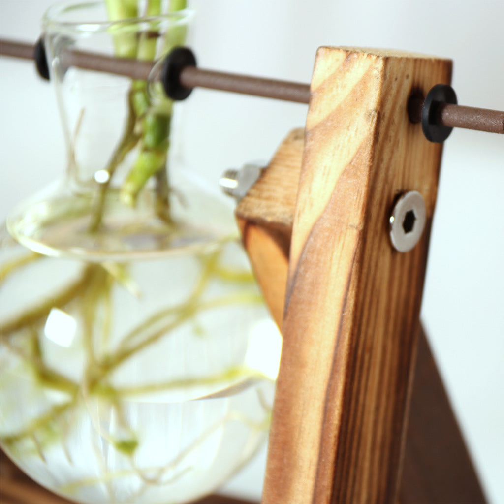 Cavira high borosilicate glass ball vase with retro wooden rack, suitable for hydroponic planters and vintage home décor.