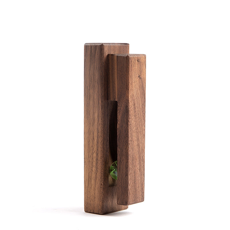 Black walnut and eucalyptus adhesive wooden single hook by Cavira, no-drill, suitable for bathroom, entryway, or bedroom.