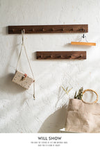 Creamy white and walnut wooden wall coat hook by Cavira with 4, 5, or 6 hooks for entryway, bedroom, or hallway decor.