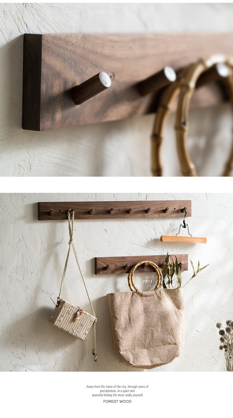 Creamy white and walnut wooden wall coat hook by Cavira with 4, 5, or 6 hooks for entryway, bedroom, or hallway decor.