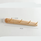 Beech wood baguette wall coat rack with 2-5 hooks, Cavira brand, designed for entryway, hallway, or bedroom decor.