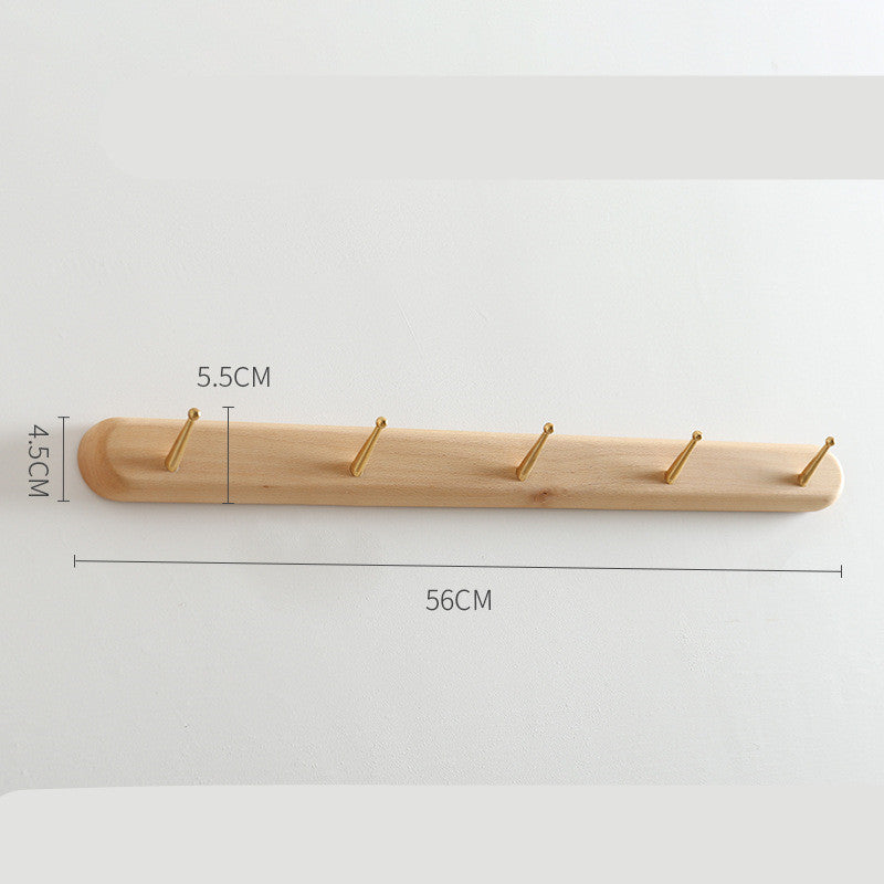 Beech wood baguette wall coat rack by Cavira with 2-5 hooks, suitable for entryway or hallway, supports 10kg load.