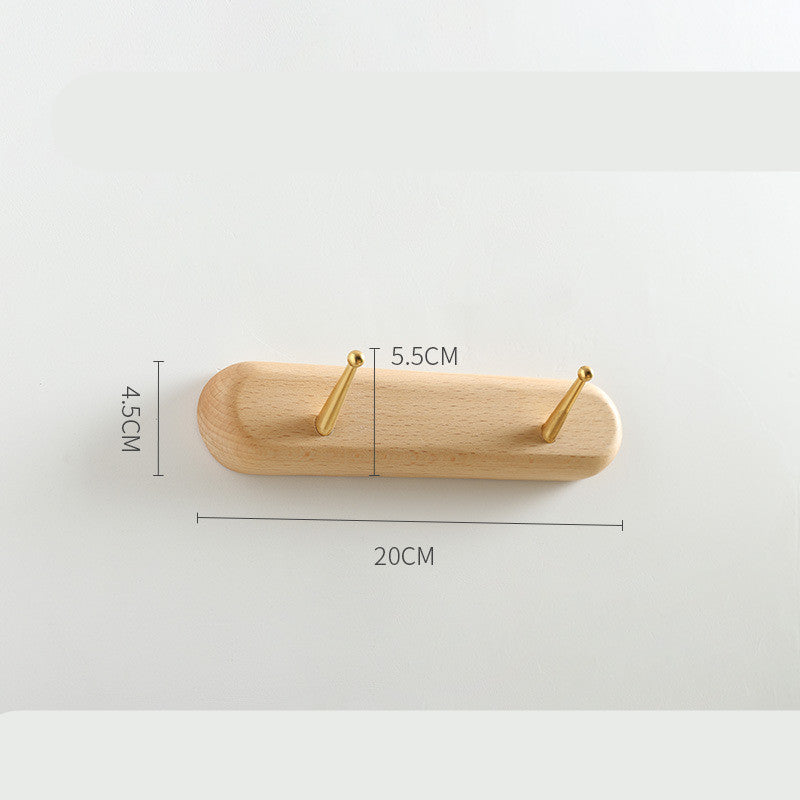 Beech wood baguette wall coat rack by Cavira with 2-5 hooks, ideal for entryway, hallway, or bedroom storage.