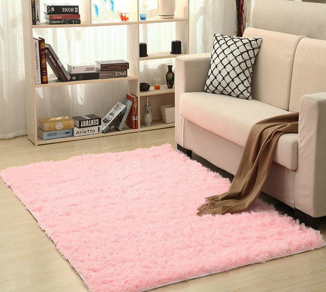 Cavira super soft shag area rug with silky polyester texture, ideal for living rooms, bedrooms, and nurseries.