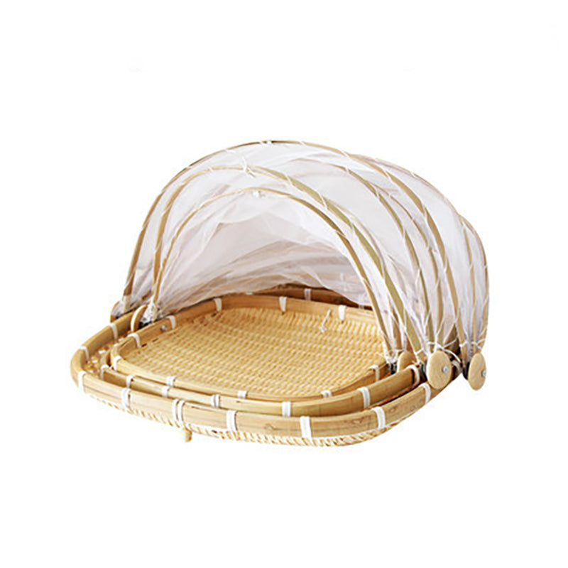 Handmade bamboo basket by Cavira, woven bread, fruit, or serving tray for kitchen, dining, and home decor.