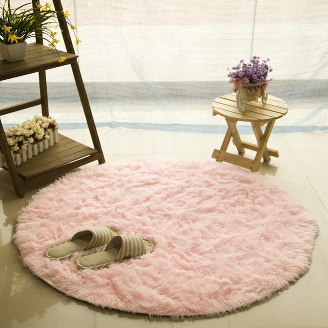 Round Cavira shaggy faux fur rug with 4.5cm deep pile in multiple sizes and colors, featuring a latex non-slip base.
