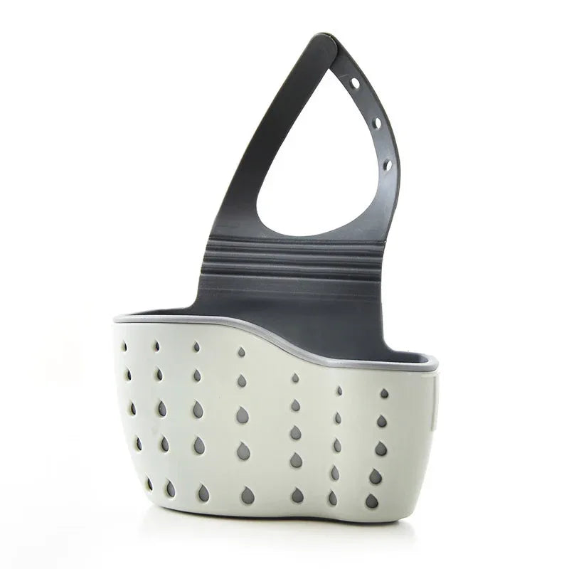 A handy kitchen accessory as sink drainer, multi - functional organizer for countertop dishes, sponges. Green