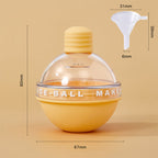 Colorful silicone light bulb ice ball mold by Cavira, creates slow-melt round ice spheres for whiskey and cocktails.