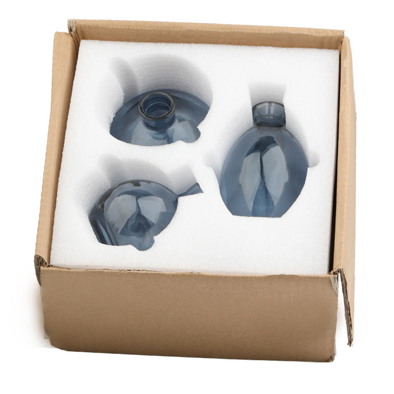 Set of three Cavira colour-dipped glass vases with light spray paint, ideal for home decor and floral arrangements.