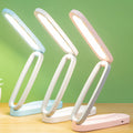 Cavira folding USB rechargeable LED desk lamp with touch control, tricolor lighting, dimmable, 1200mAh battery, ideal for study and reading.