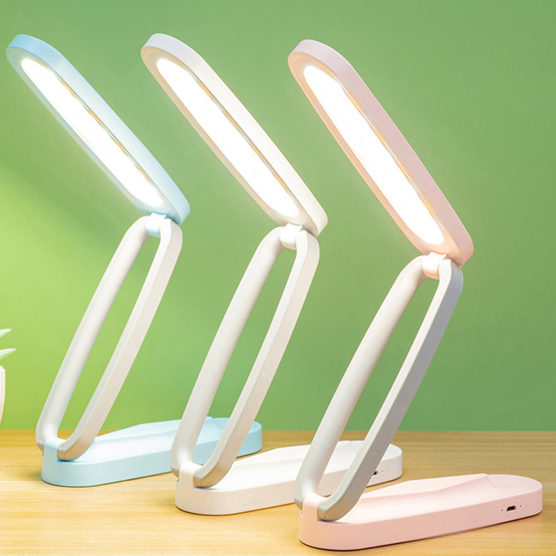 Cavira folding USB rechargeable LED desk lamp with touch control, tricolor lighting, dimmable, 1200mAh battery, ideal for study and reading.