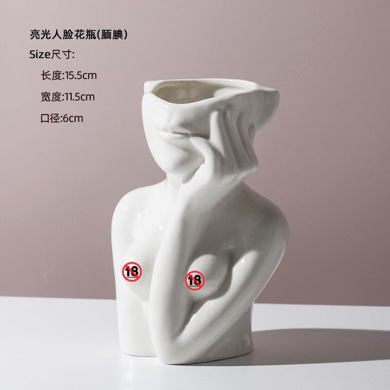 Ceramic art vase by Cavira featuring a Nordic sculptural human body figure, ideal for home decor and shelf styling.