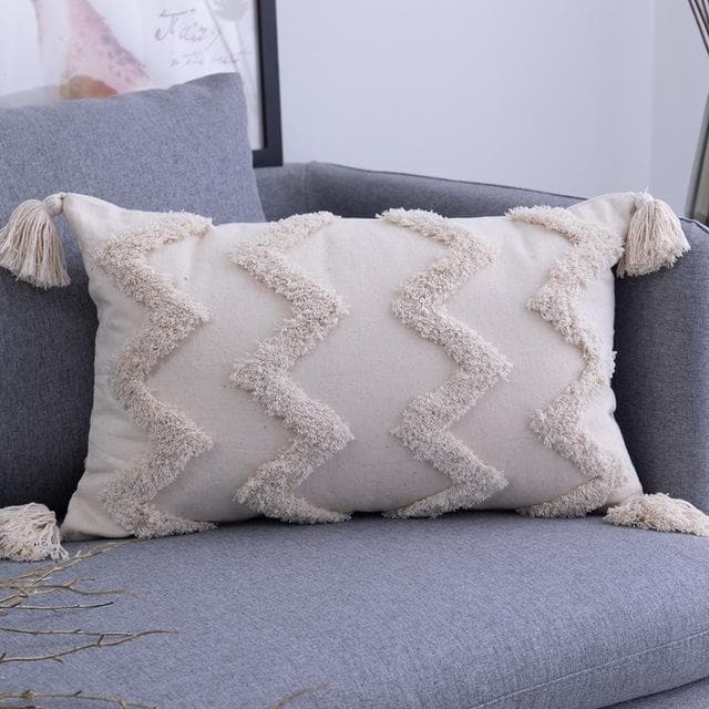 Hand embroidered bohemian cotton throw pillow cover by Cavira, minimalist woven cushion for sofa, bedroom, or living room decor.