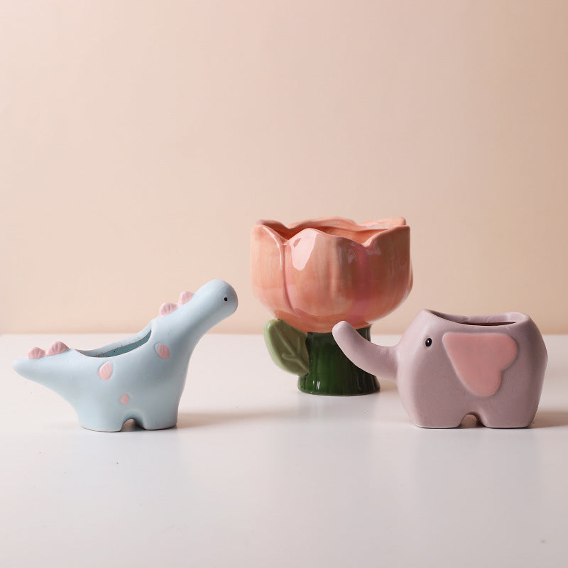Ceramic succulent pot with elephant, dinosaur, and flower designs by Cavira, small plant pot for desk, shelf, or balcony decor