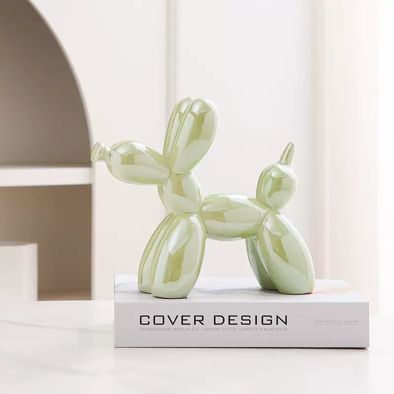 Cavira ceramic balloon dog sculpture, modern minimalist home décor ornament in various colors, 20x18cm, on shelf or desk.
