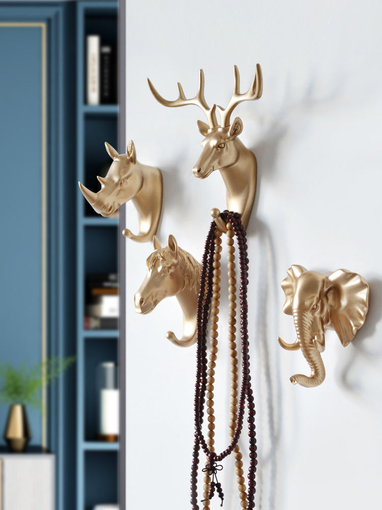 Nordic resin animal wall hook and key rack by Cavira, decorative punch-free hanger for entryway, bedroom, and home decor.