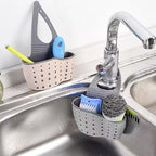 A handy kitchen accessory as sink drainer, multi - functional organizer for countertop dishes, sponges.
