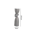 Black and white striped resin candle holder with modern irregular geometric design, ideal for home decor.