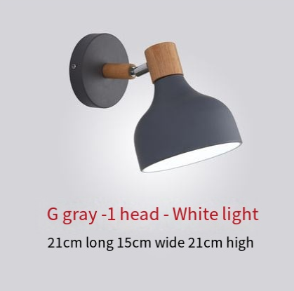 Nordic wooden iron bedside wall lamp by Cavira, minimalist wall light for bedroom, corridor, or restaurant decor, mounted on a wall.