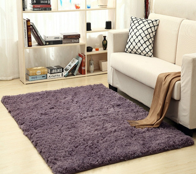 Cavira super soft shag area rug with silky polyester texture, modern floor mat for living room, bedroom, and nursery decor.