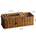 Plastic rattan-style tissue and remote control storage box in dark and light colors, multifunctional for living and dining rooms.