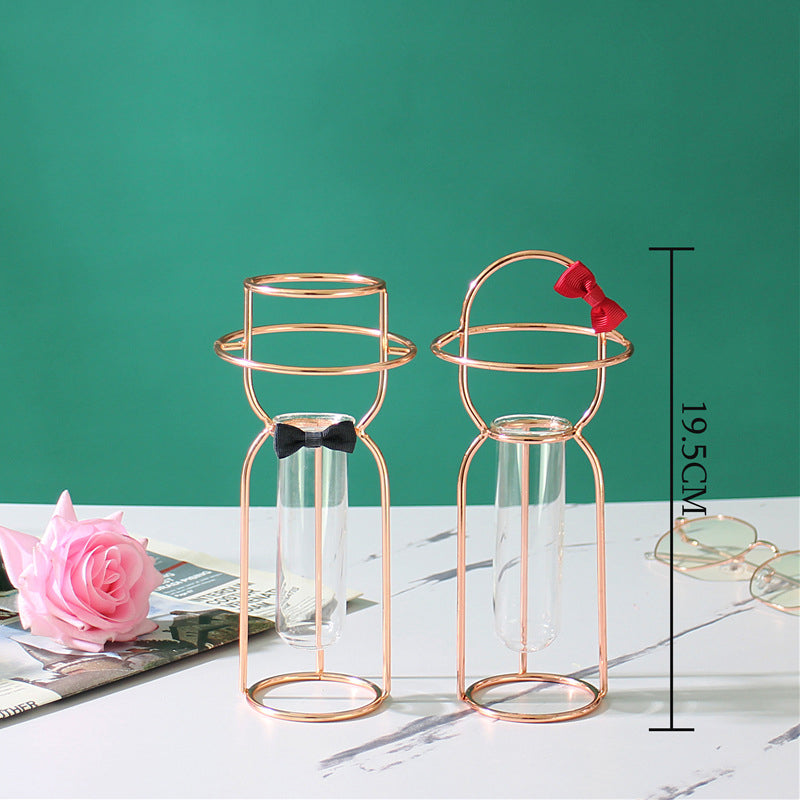 Cavira gold and rose gold decorative glass vase with intricate design, ideal for flower arrangements and home decor.