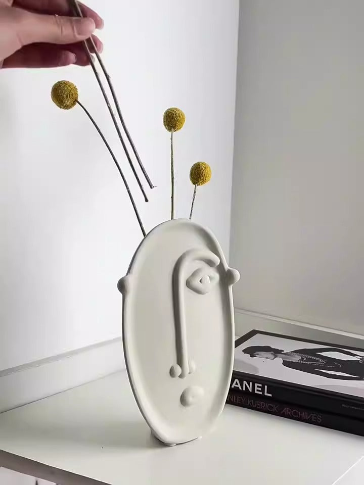 Ceramic vase with geometric abstract face design by Cavira, ideal for home decor, shelf styling, or gifting.