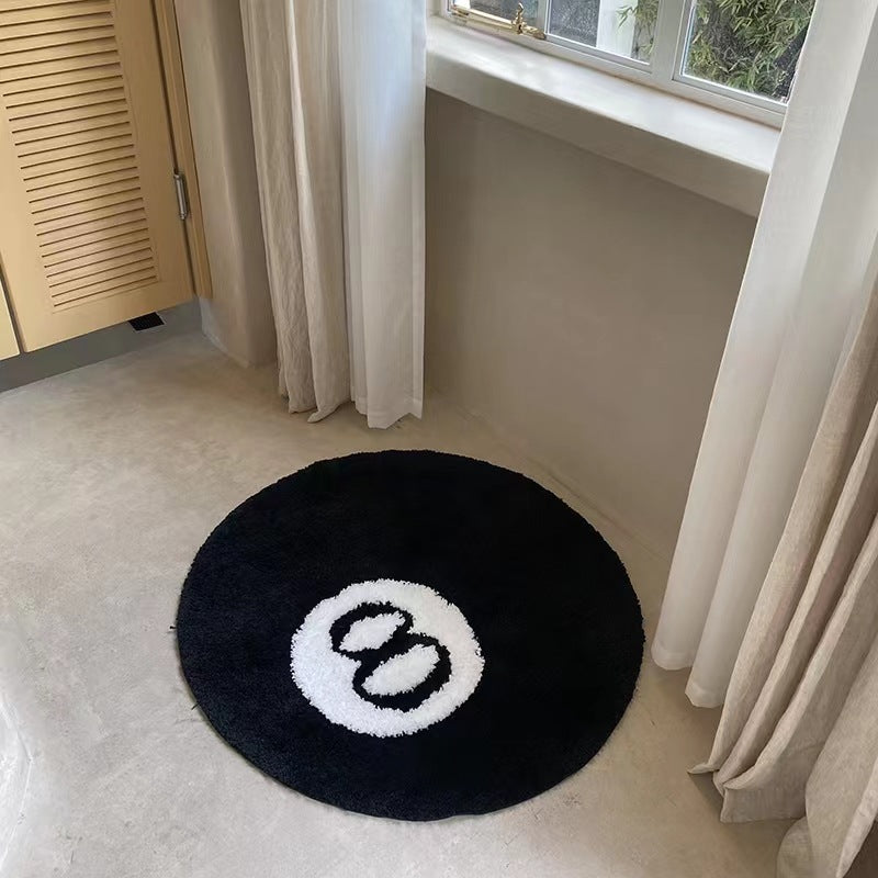 Black flocked square rug by Cavira, non-slip velvet-touch floor mat in 60, 80, or 100cm, suited for living rooms and bedrooms.