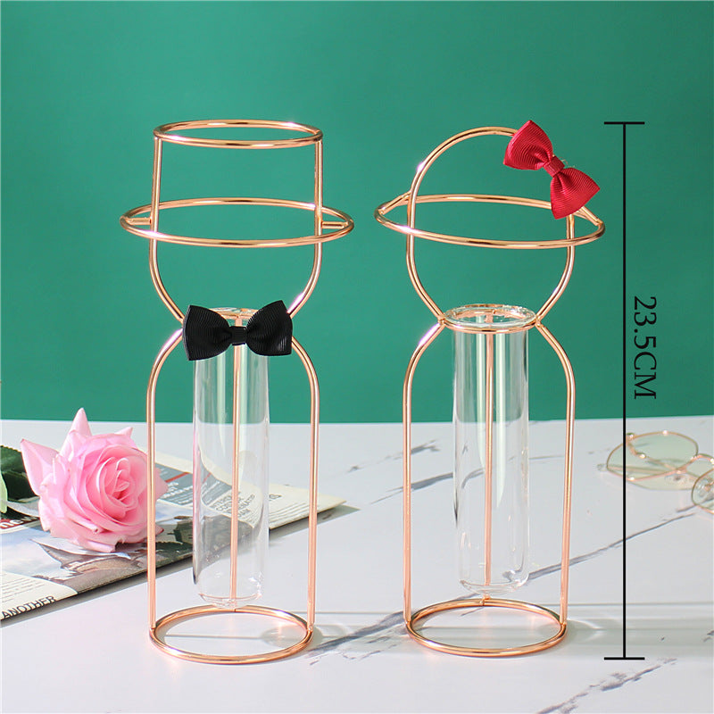 Gold and rose gold decorative glass vase by Cavira, ideal for flower arranging and stylish home decor.