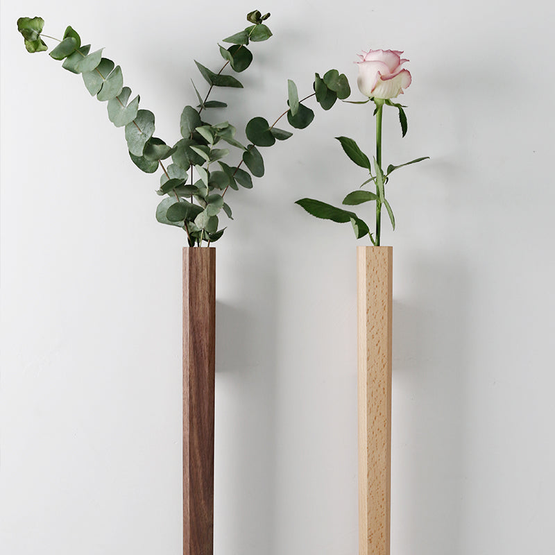Cavira solid wood wall hanging vase with glass insert for hydroponic plants, ideal for living room or bedroom decor.