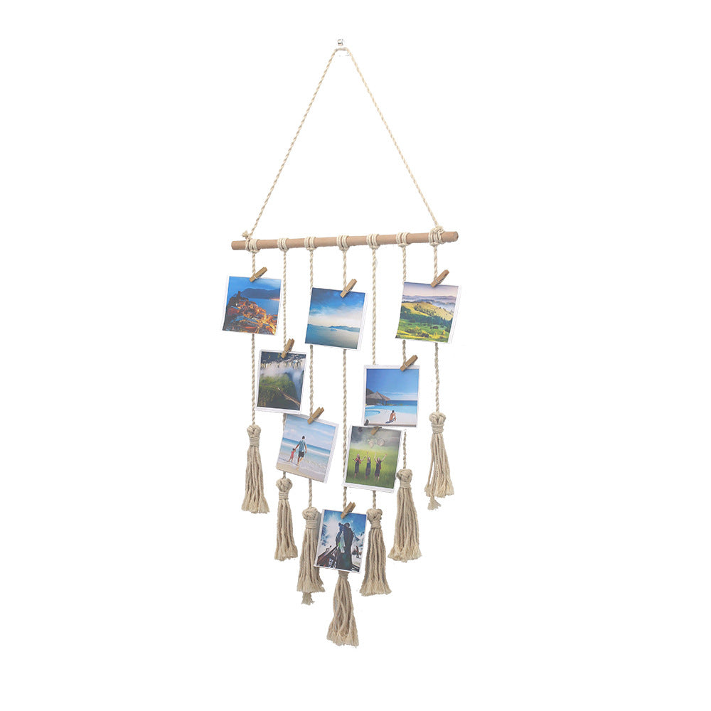 Handwoven cotton wall tapestry by Cavira with geometric design, wooden ring, and mini clips for bedroom or living room decor.