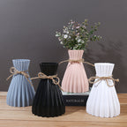 Cavira minimalist folded paper vase with twine detail, designed for plastic flower arrangements, perfect for home decor or gifting.