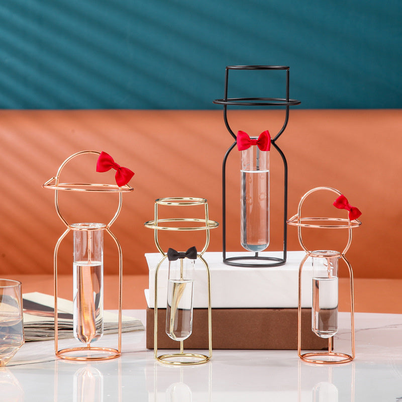 Gold and rose gold decorative glass vase by Cavira, designed for flower arrangements and home decor.