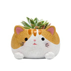 Cute cat-shaped resin succulent planter by Cavira, 10x10.5x6.8cm, ideal for desktop, balcony, or shelf décor.