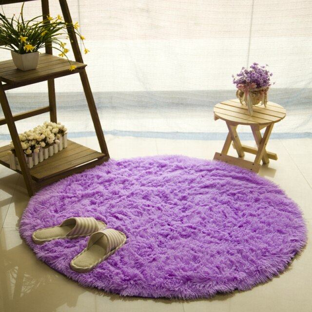 Round Cavira shaggy faux fur rug with 4.5cm pile, available in 6 sizes and 8 colors, featuring a non-slip latex base.