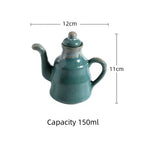 Cavira ceramic oil and vinegar dispenser bottle with auto-open lid, 150ml, blue and white for soy sauce, oil, and condiments.