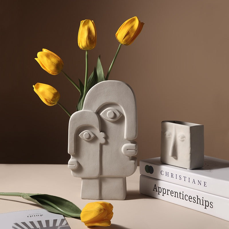 Ceramic vase with geometric abstract face design by Cavira, ideal for home decor, shelf styling, or gifting.
