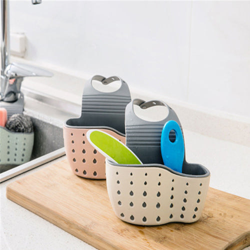 A handy kitchen accessory as sink drainer, multi - functional organizer for countertop dishes, sponges.